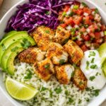 Air Fryer Chili Lime Cod Taco Bowls with cilantro lime rice, avocado, cabbage, and pico de gallo