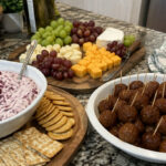 A variety of easy Thanksgiving appetizers on a home kitchen counter.